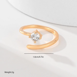 Detailed view of leaf design gold ring showing 1.8cm diameter and 2g weight specs
