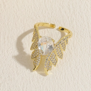 Elegant 14K gold plated ring featuring a pear-shaped cubic zirconia and wing design