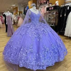 Elegant purple tiered tulle ball gown with 3D butterfly appliques and a matching cape