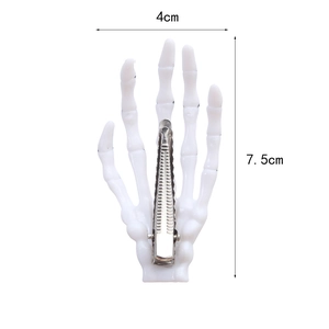 Halloween skeleton hand hair clips featuring realistic white bone design and metal alligator clip