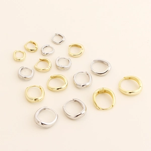 Detailed collection of irregular geometric hoop earrings in gold and silver metal finishes