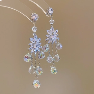 Elegant silver pearl earrings with geometric floral fringe and sparkling crystal tassels