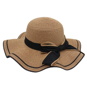 French style straw sun hat with large wavy brim and black ribbon bow for women