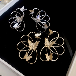 Gold and silver butterfly hoop earrings with hollow metal line flower design for women