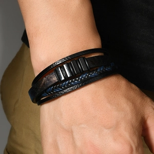 Men's multilayer faux leather bracelet with snake pattern and navy blue braided cord detail