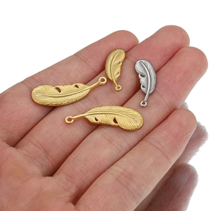 Vintage stainless steel feather pendants in gold and silver finishes and two sizes