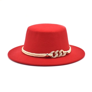 Red wool flat top boater hat with white woven band and gold decorative metal link buckle