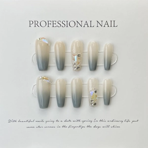 Handmade gradient grey press-on nails with glitter rhinestones in long coffin shape