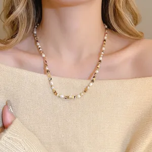 Elegant freshwater pearl and gold geometric bead necklace for women in vintage style