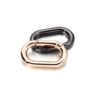 Polished oval spring snap hooks in gold and gunmetal finish for bags and DIY crafts
