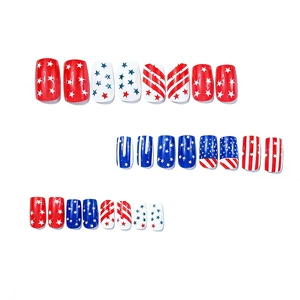 24-piece set of American flag press-on nails with red stripes and blue star patterns