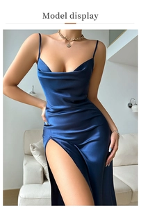 Detail view of deep blue satin slip dress featuring a cowl neck and high side slit design