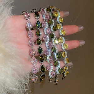 Macro shot of colorful cubic zirconia teardrop bracelets with sparkling glitter effect