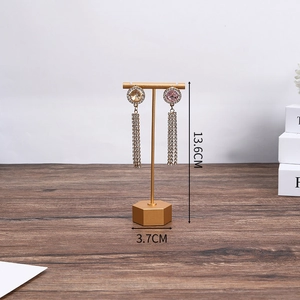 Golden T-bar jewelry stand for earrings with 13.6cm height and 3.7cm base dimensions