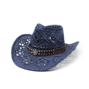 Detail of navy blue hand-woven cowboy hat with vintage studded brown leather band