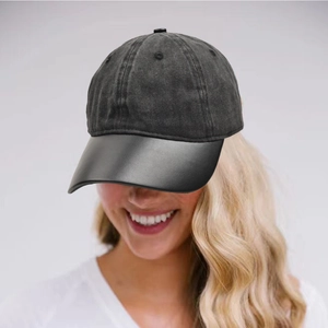 Unisex washed cotton baseball cap with vintage distressed texture and leather brim detail