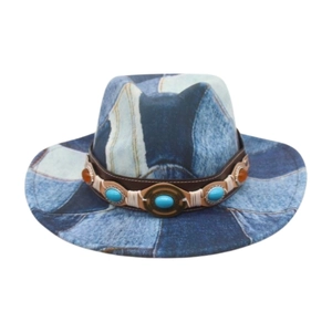 Detail of blue denim patchwork cowboy hat with brown leather belt and turquoise gemstones