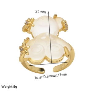 Detailed view of adjustable gold pig ring with dimensions and inner diameter measurements