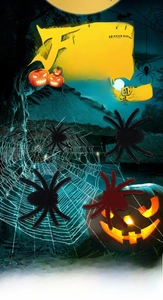 Detailed view of realistic fuzzy Halloween spiders with glowing pumpkins and webs