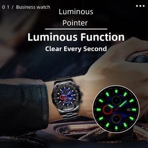 Luminous hands and markers on black steel business watch shown in a night driving scene