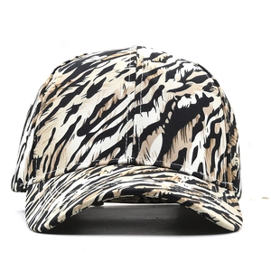 Detailed close-up of the tiger pattern fabric and stitching on this baseball cap