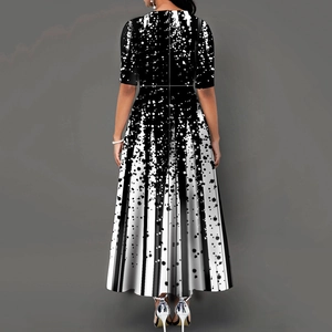 Back view of a long A-line dress with black and white gradient print and short sleeves