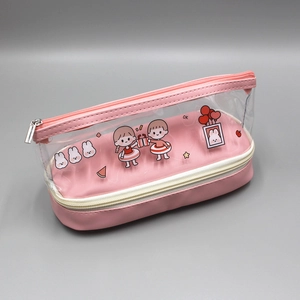 Vue détaillée de la trousse rose double couche avec motifs de filles et lapins