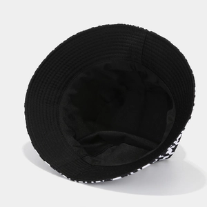 Cappello da pescatore reversibile da donna con stampa pied de poule bianca e nera estivo