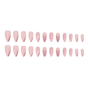 Long almond French press-on nails with pink glitter stars and rhinestone accents