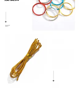 Detail of colorful metal rings and golden hollow hair wire for braiding accessories