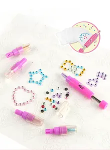 Detail of DIY hair gem sticker kit featuring colorful rhinestones and pink applicator tool