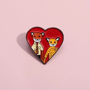 Fantastic Mr. Fox inspired red heart enamel pin featuring cute fox couple design