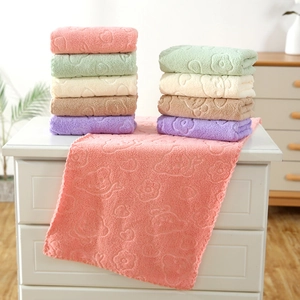Soft coral fleece facial towel with bear embossing in assorted pastel colors
