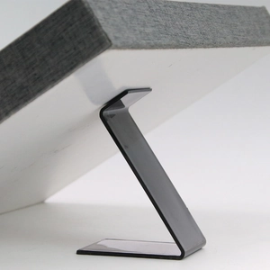 Black acrylic jewelry display stand with a 45-degree angle view on a white background