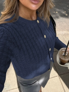 Navy blue cable knit cardigan with gold buttons and round neck for women