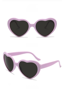 Front and 45-degree side views of light purple heart-shaped sunglasses with dark lenses