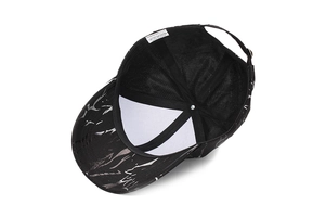 Detail view of polyester baseball cap interior with mesh band and marble pattern