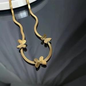 Elegant gold snake chain necklace with three dimensional butterfly pendants for women