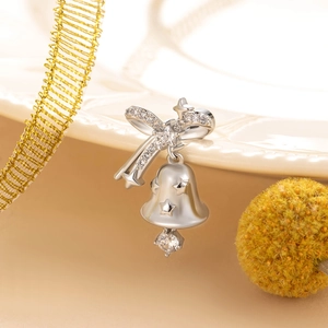 Silver bow and star bell earring pendant crafted in polished stainless steel