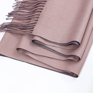 Classic brown reversible cashmere scarf with soft woven texture and fringe details