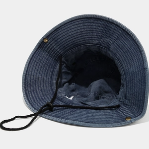 Outdoor wide brim washed denim bucket hat in dark blue with adjustable chin strap