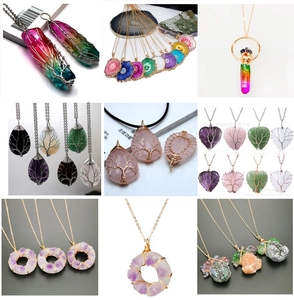 Macro view of assorted natural amethyst and quartz pendants with handmade wire wrapping