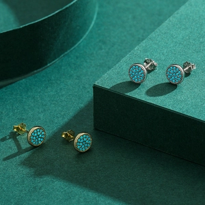 Silver and gold S925 sterling silver turquoise stud earrings with textured edge design