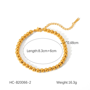 Detailed view of 18K gold bead bracelet with 0.48cm spheres and size specifications