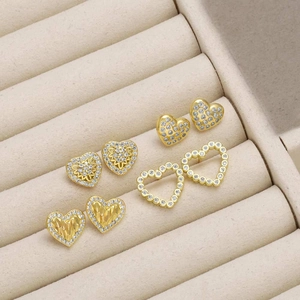 Set of four 18k gold plated heart stud earrings with sparkling white cubic zirconia