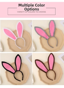 Detail view of rabbit ear headbands in white, grey, black and brown for party costumes