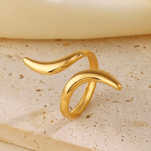 Polished 18K gold plated minimalist wavy open ring for women on a marble and silk base