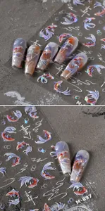 Macro view of holographic koi fish and calligraphy stickers on iridescent nails