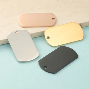 Polished stainless steel dog tag pendants in rose gold, silver, gold, and black colors