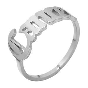 Detailed macro view of the silver Libra zodiac ring featuring Gothic style lettering